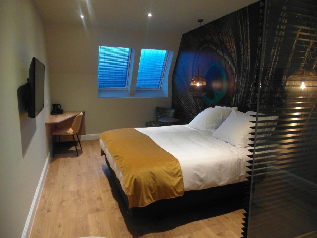 Hotel Sanders De Paauw Слёйс Экстерьер фото
