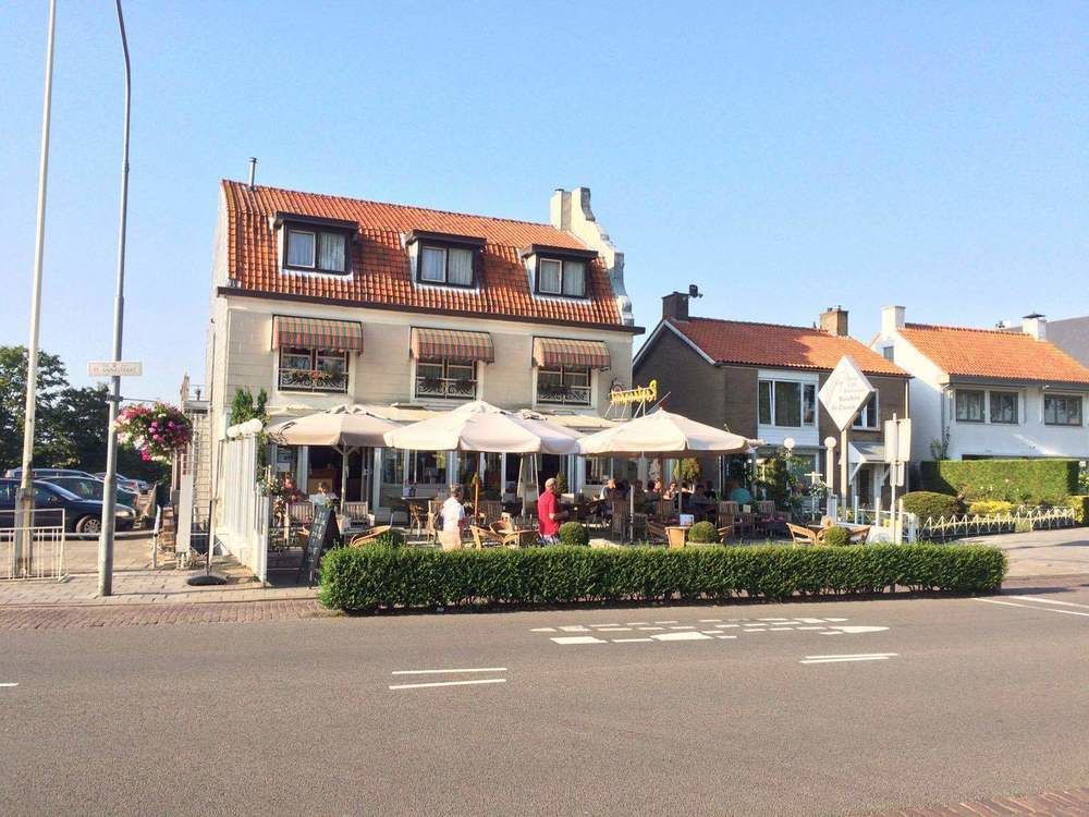 Hotel Sanders De Paauw Слёйс Экстерьер фото