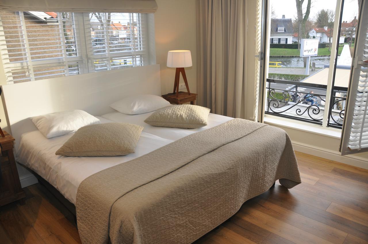Hotel Sanders De Paauw Слёйс Экстерьер фото