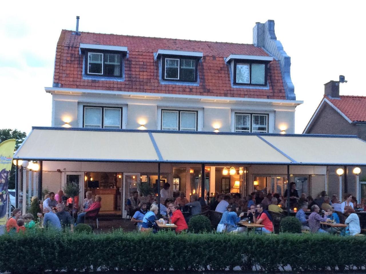 Hotel Sanders De Paauw Слёйс Экстерьер фото